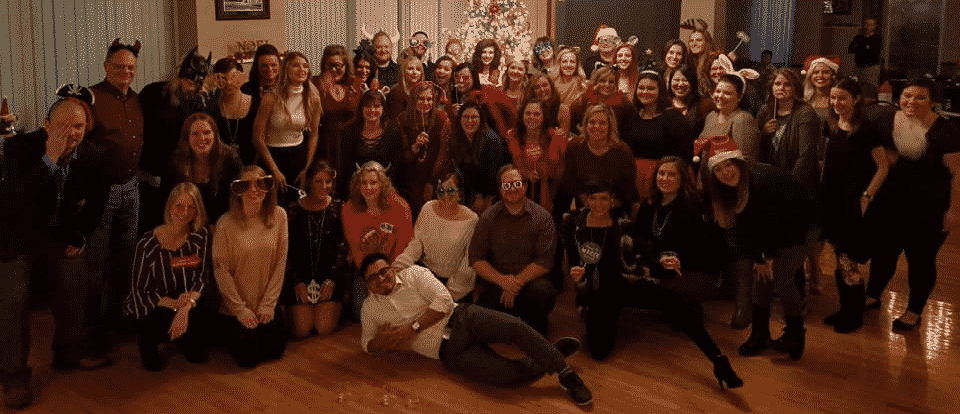 Picture of the Woods and Woods VA DIsability Lawyer team having fun at our Christmas party.
