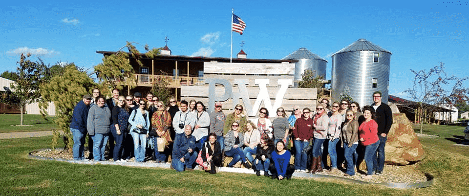 Our staff from Woods and Woods enjoying a wine tour as an employee benefit.