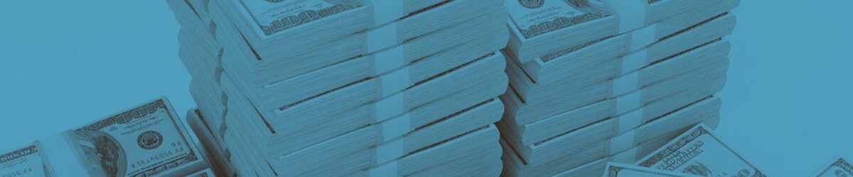Picture of many stacks of 100 dollar bills wrapped in bundles. It has a blue tone over it and our title is in white text in the front: How to Avoid Pyramiding: Don't Stack Your Disability Benefits